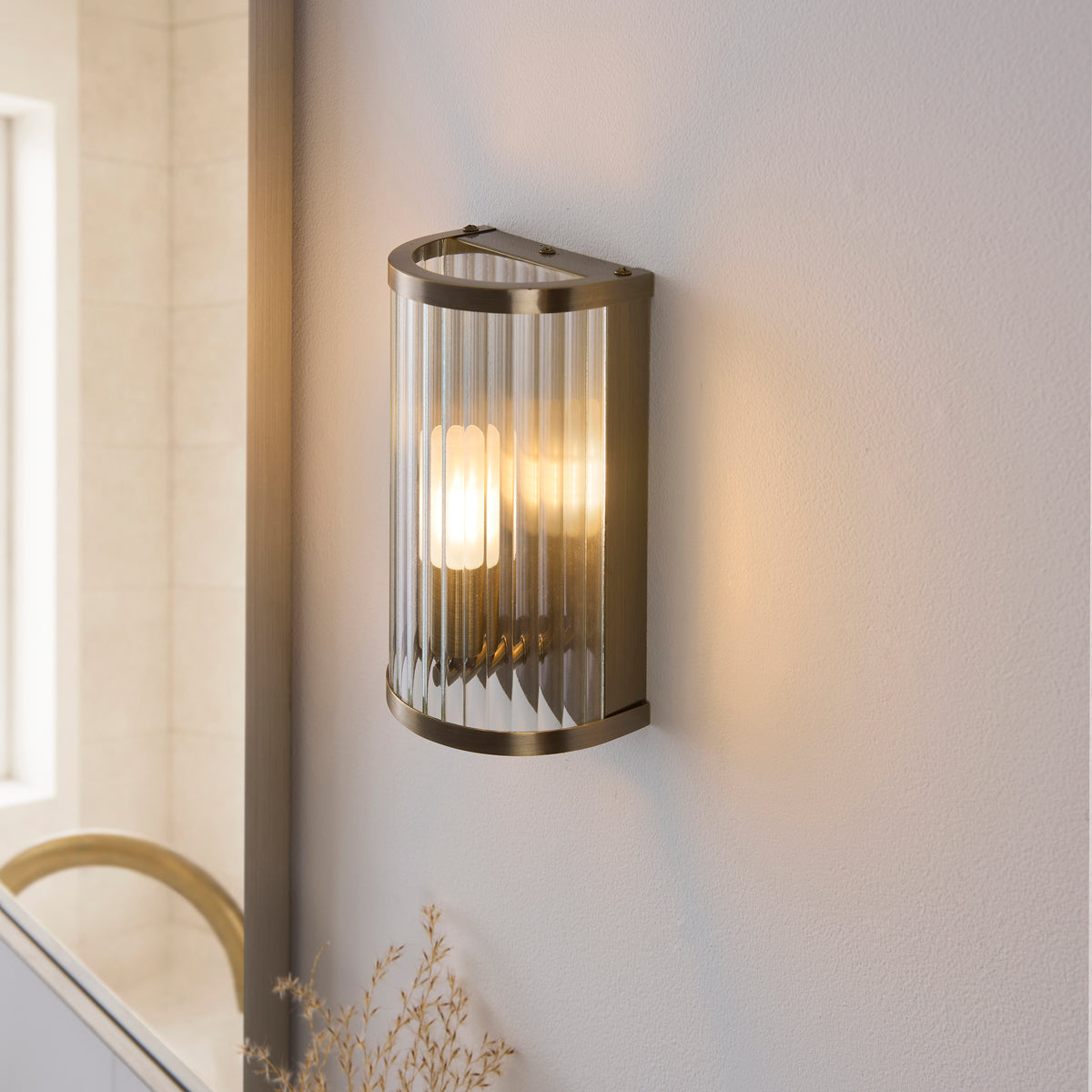 Ridgeton IP44 Wall Light in Antique Brass with Clear Ribbed Glass