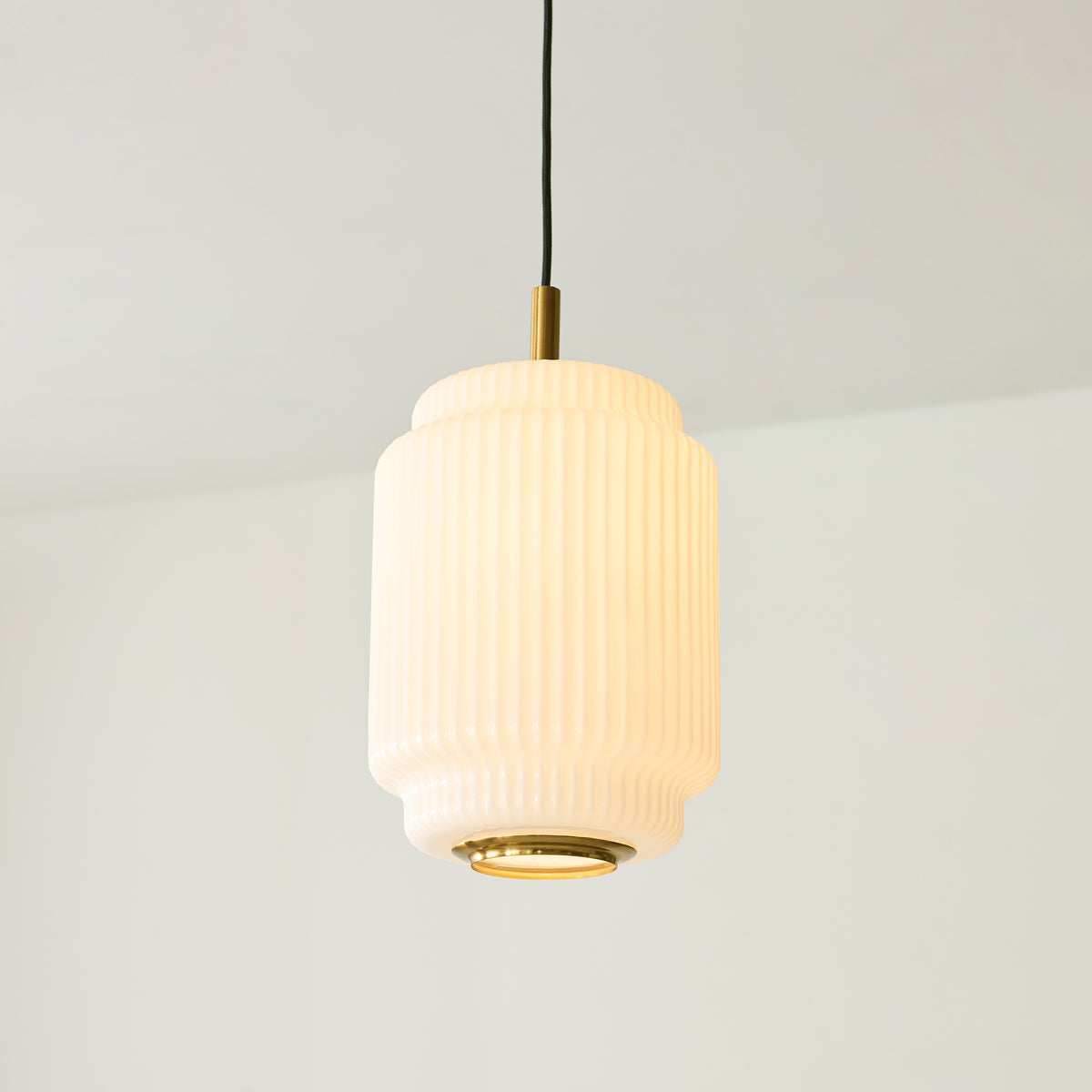 Evora 220 Single Drop Pendant in Brushed Aged Brass with Gloss Opal Ribbed Glass