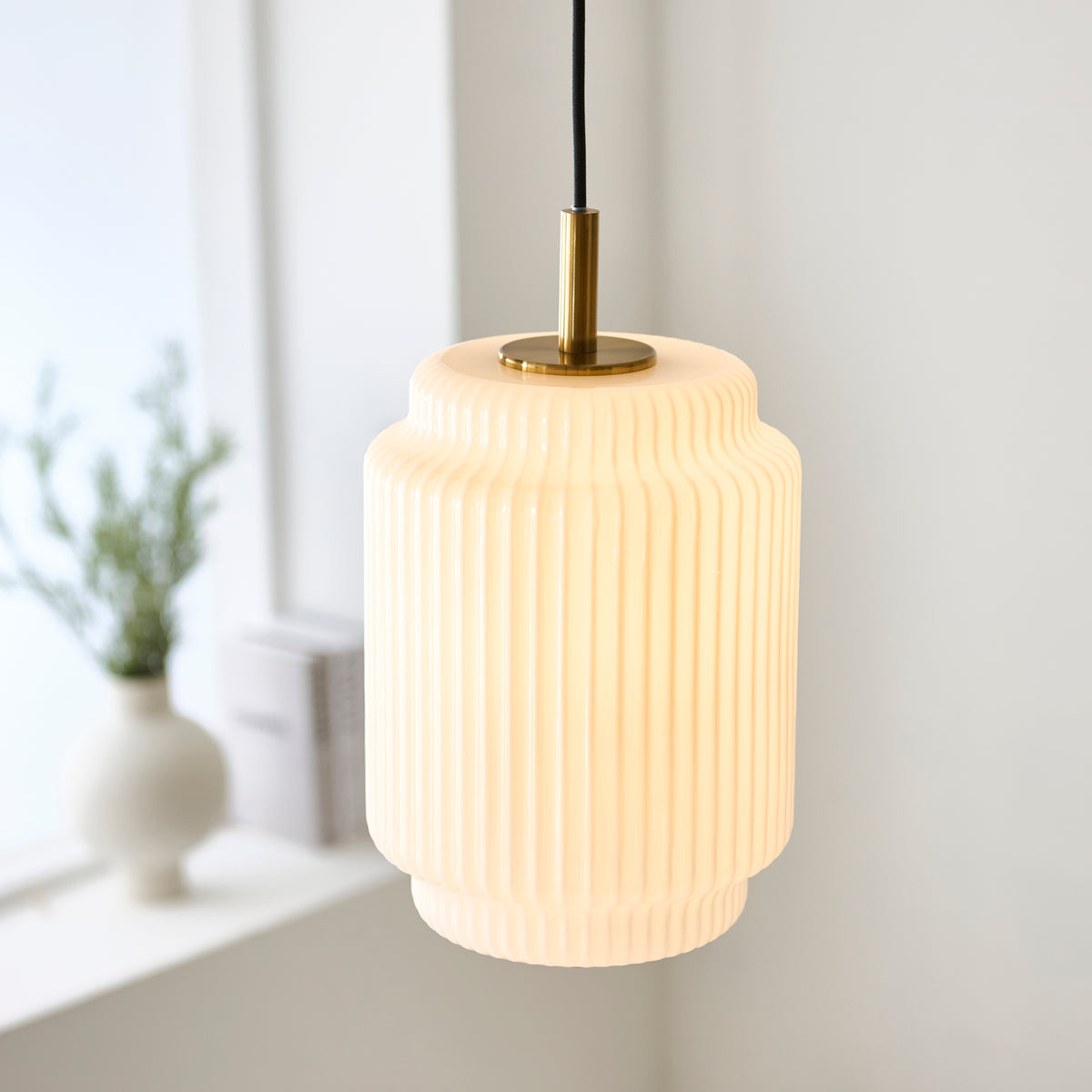 Evora 220 Single Drop Pendant in Brushed Aged Brass with Gloss Opal Ribbed Glass