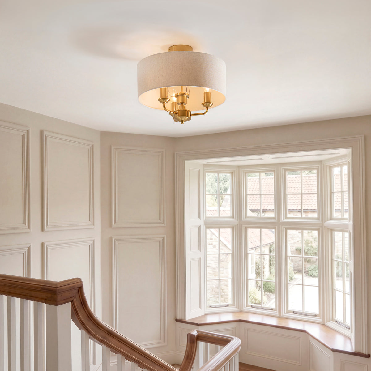Highclere Three Light Semi Flush in Vintage Brass with Natural Shade