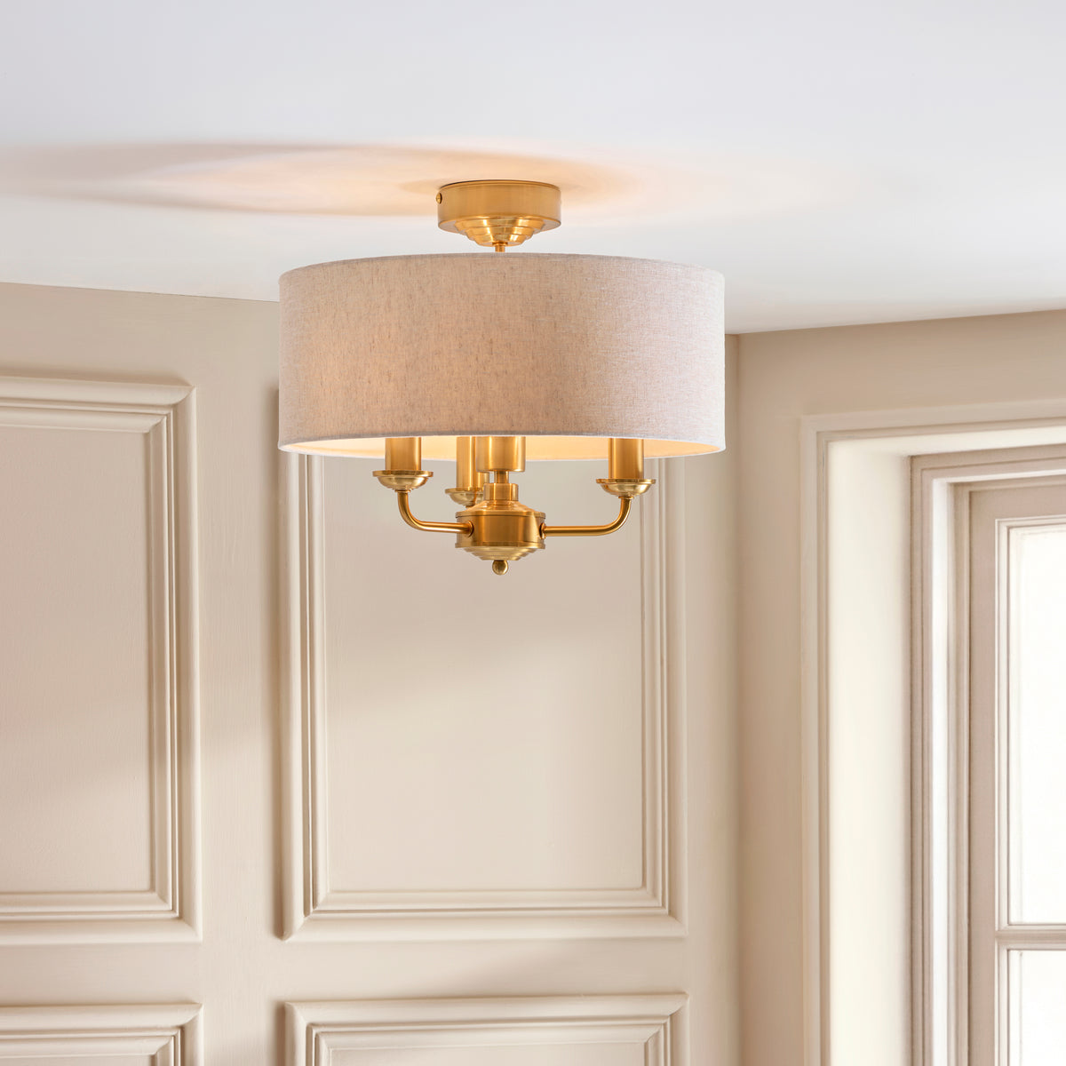 Highclere Three Light Semi Flush in Vintage Brass with Natural Shade