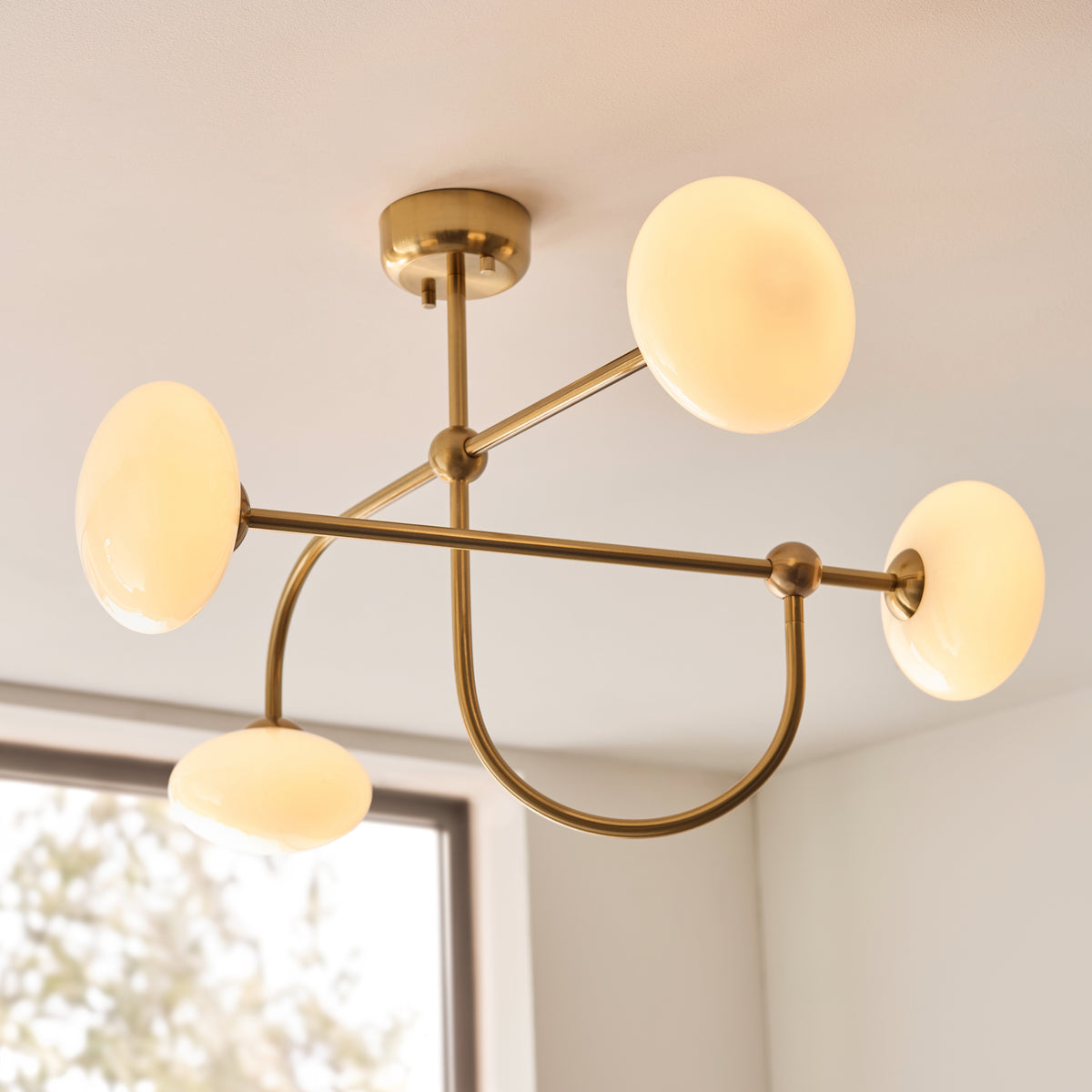 Ottowa Four Light Semi Flush in Brushed Aged Brass with Opal Glass Shades