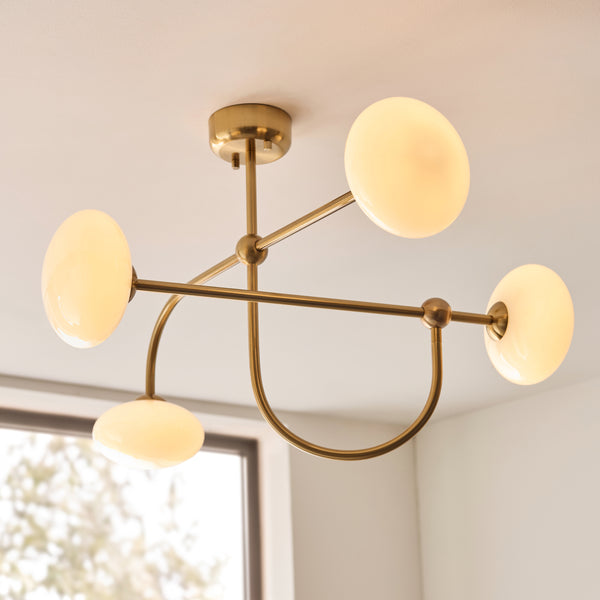 Ottowa Four Light Semi Flush in Brushed Aged Brass with Opal Glass Shades