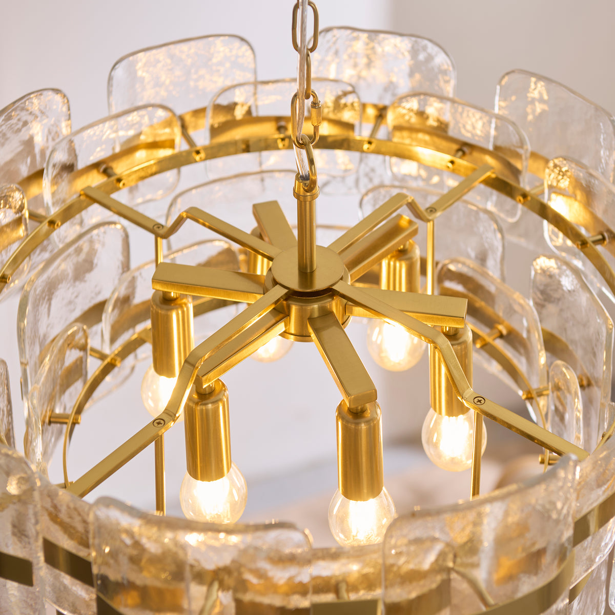 Ancara Six Light Pendant in Brushed Aged Brass with Clear Textured Glass Panels