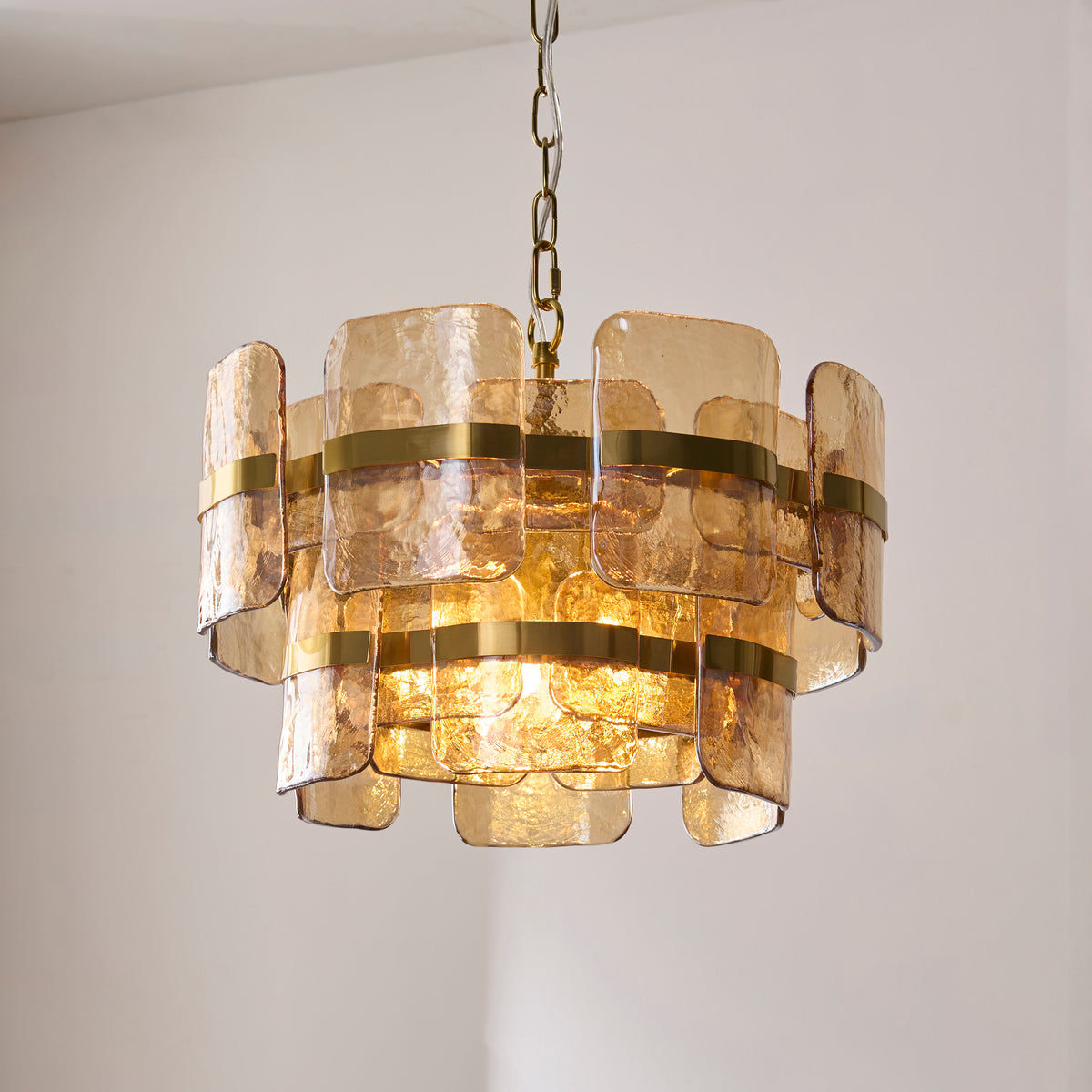 Ancara Three Light Pendant in Brushed Aged Brass with Champagne Textured Glass Panels