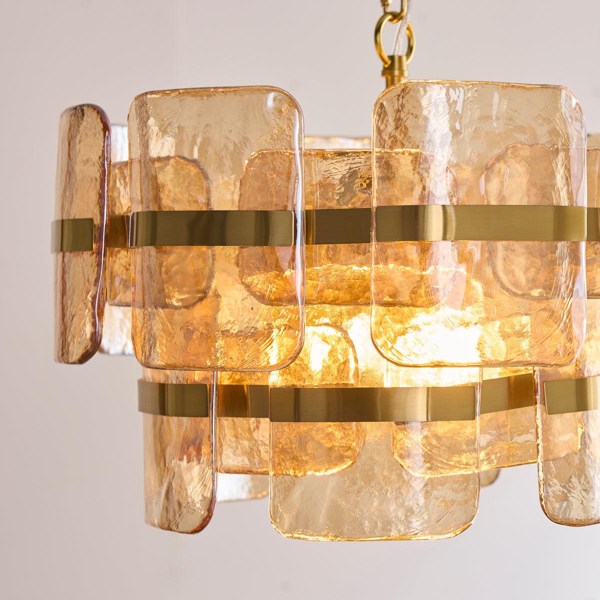 Ancara Three Light Pendant in Brushed Aged Brass with Champagne Textured Glass Panels