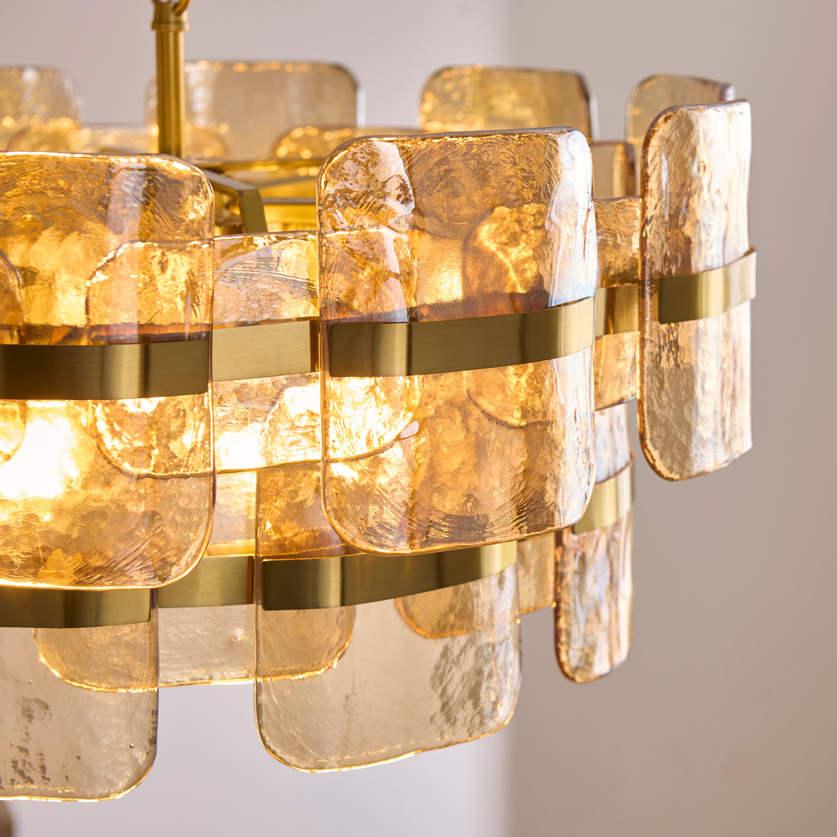 Ancara Six Light Pendant in Brushed Aged Brass with Champagne Textured Glass Panels