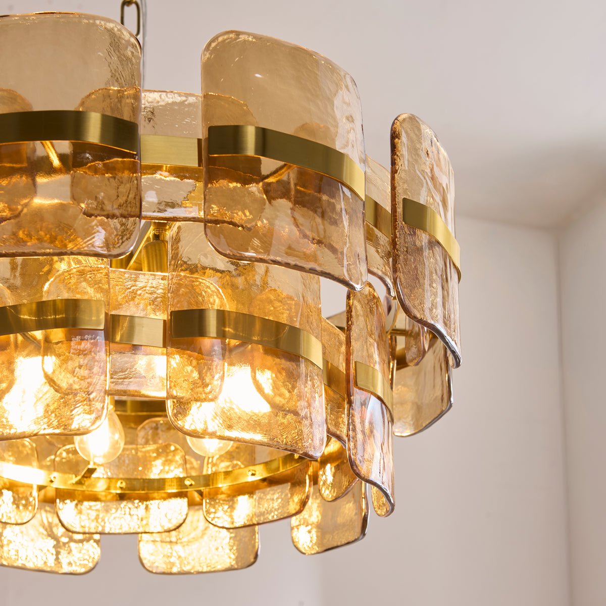 Ancara Six Light Pendant in Brushed Aged Brass with Champagne Textured Glass Panels