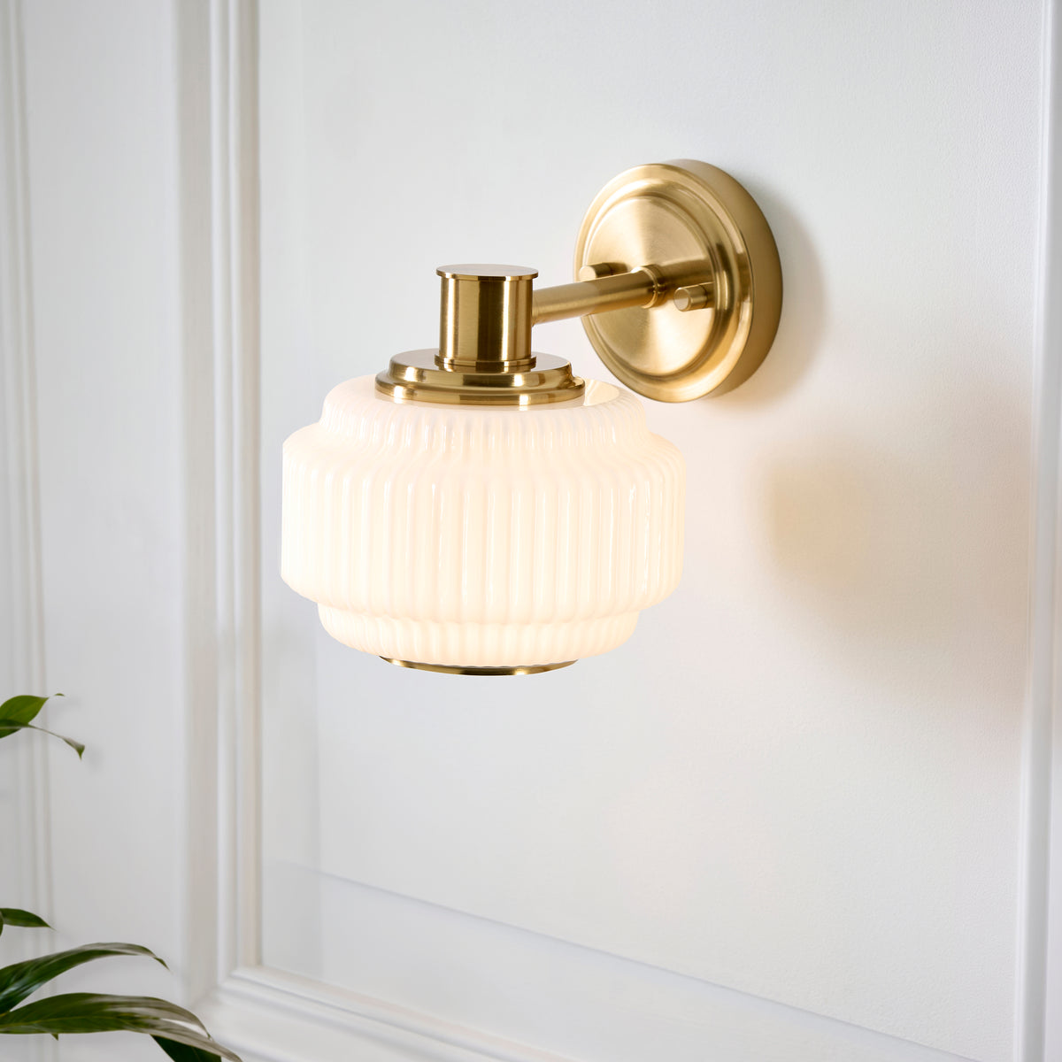 Evora Wall Light in Brushed Aged Brass with Gloss Opal Ribbed Glass