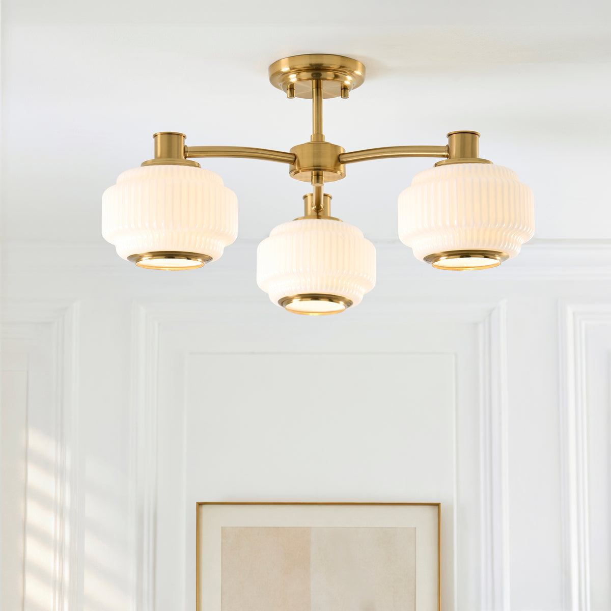 Evora Three Arm Semi Flush in Brushed Aged Brass with Gloss Opal Ribbed Glass Shades