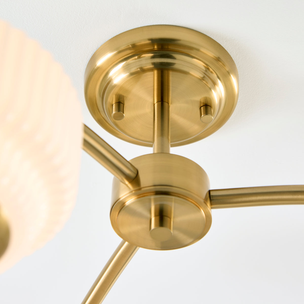 Evora Three Arm Semi Flush in Brushed Aged Brass with Gloss Opal Ribbed Glass Shades