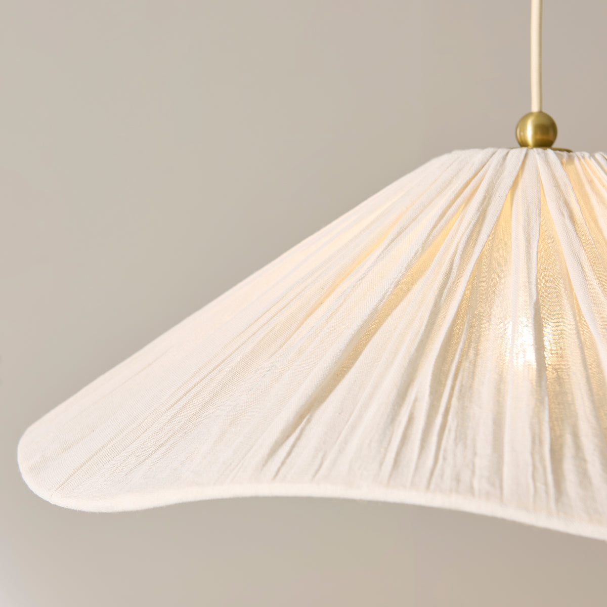 Isabella Grand Pendant in Brushed Aged Brass with Flowing Vintage White Fabric Shade