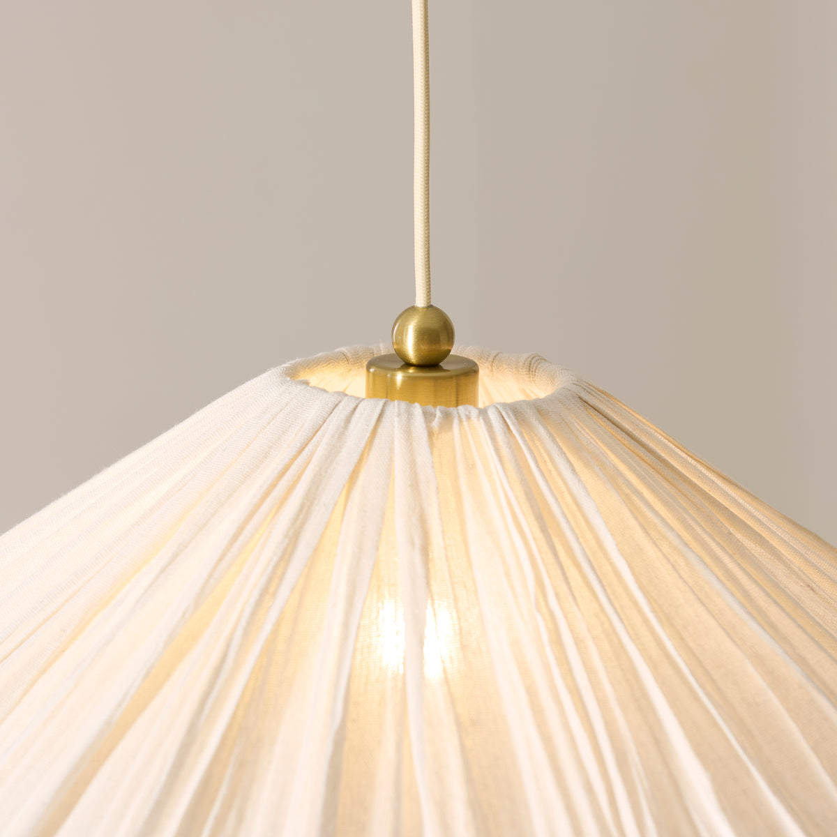 Isabella Grand Pendant in Brushed Aged Brass with Flowing Vintage White Fabric Shade