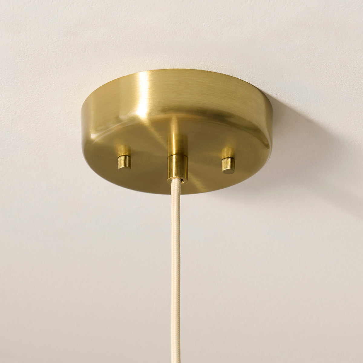 Isabella Grand Pendant in Brushed Aged Brass with Flowing Vintage White Fabric Shade