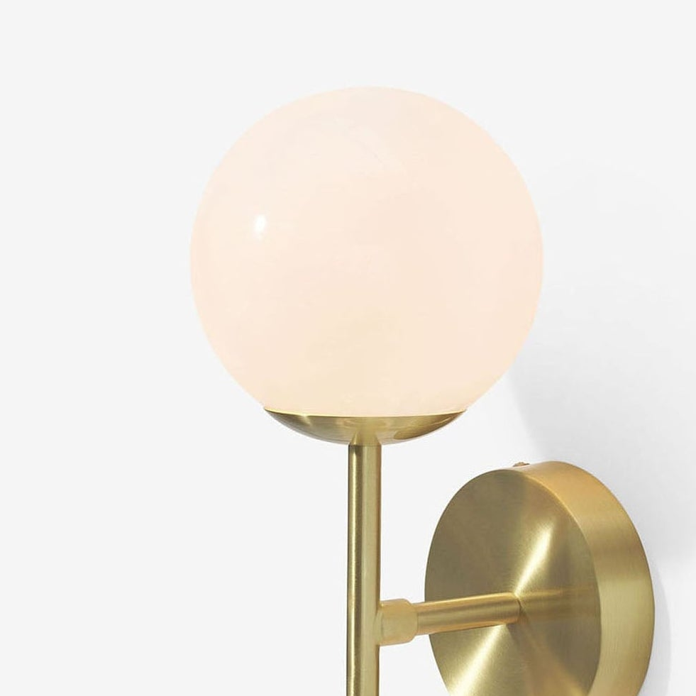 Globe Wall Light in Brushed Brass with Opal Glass Shades