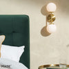 Globe Wall Light in Brushed Brass with Opal Glass Shades