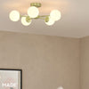Globe 5 Light Semi Flush Ceiling Light in Brushed Brass with Opal Glass Shades