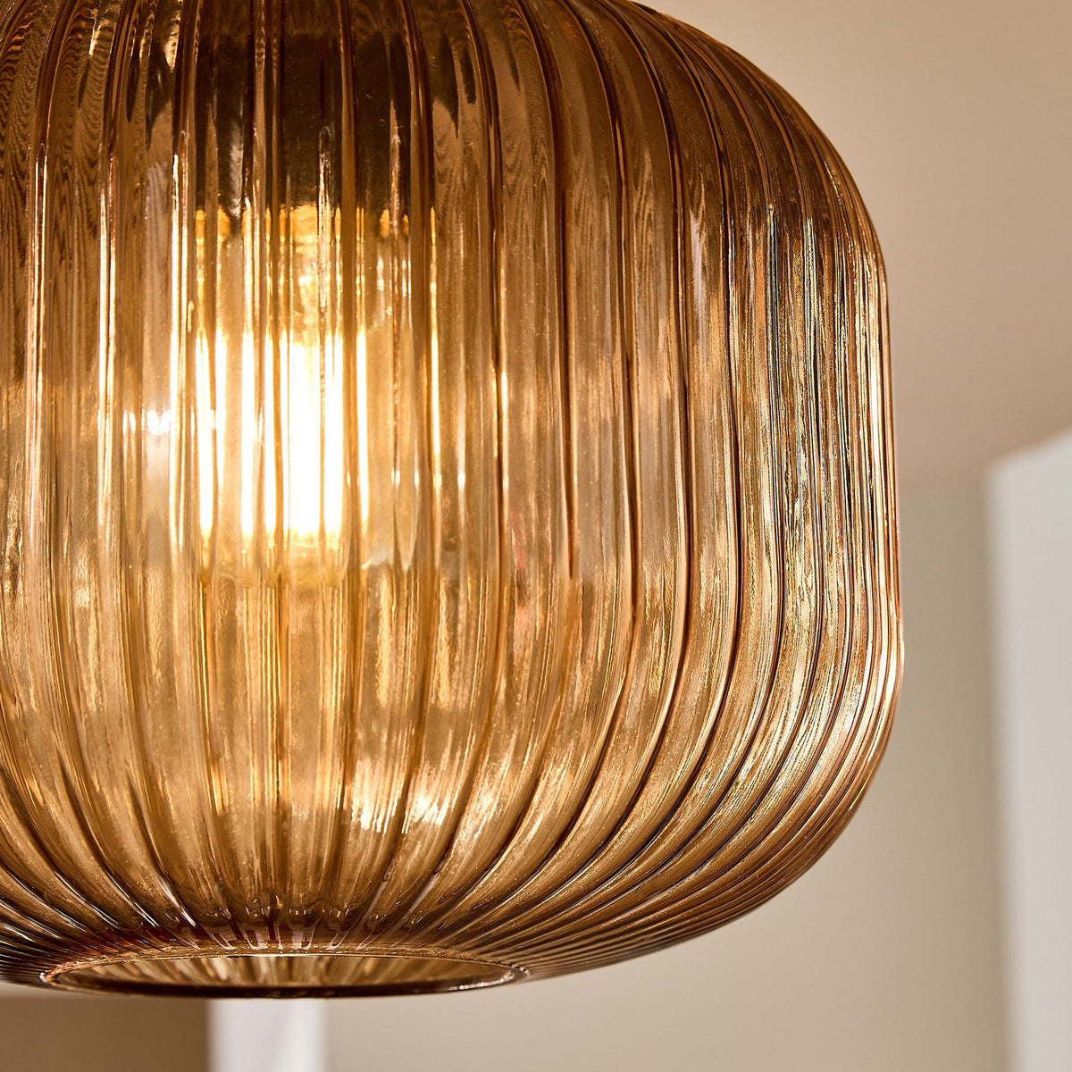 Briz Semi Flush Ceiling Light in Antique Brass with Ribbed Amber Brown Glass Shade
