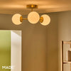 Globe 3 Light Semi Flush Ceiling Light in Brushed Brass with Opal Shades