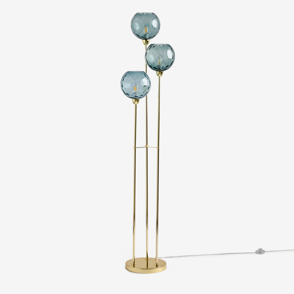 Three blue glass orb shades on gold metal stems floor lamp