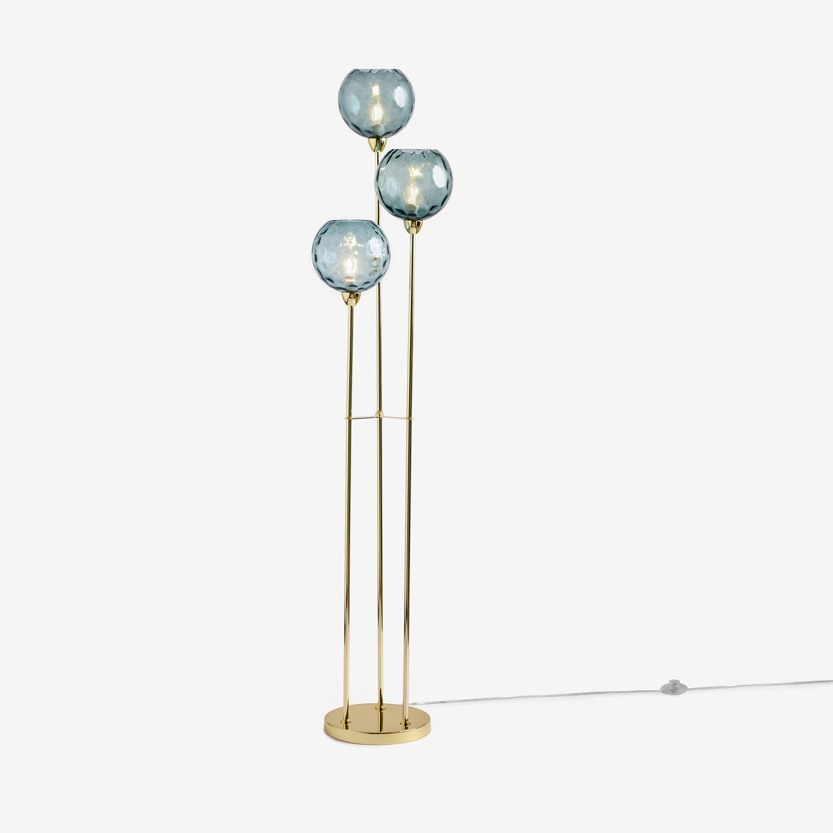 Three light floor lamp with gold finish and blue glass globe shades