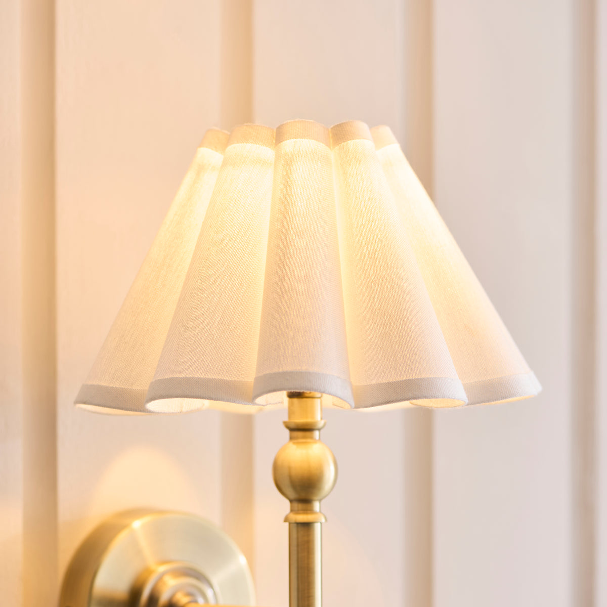 Sylvie Wall Light in Antique Brass with Vintage White Cotton Fabric Shade