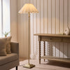 Sylvie Floor Lamp in Antique Brass with Vintage White Cotton Fabric Shade