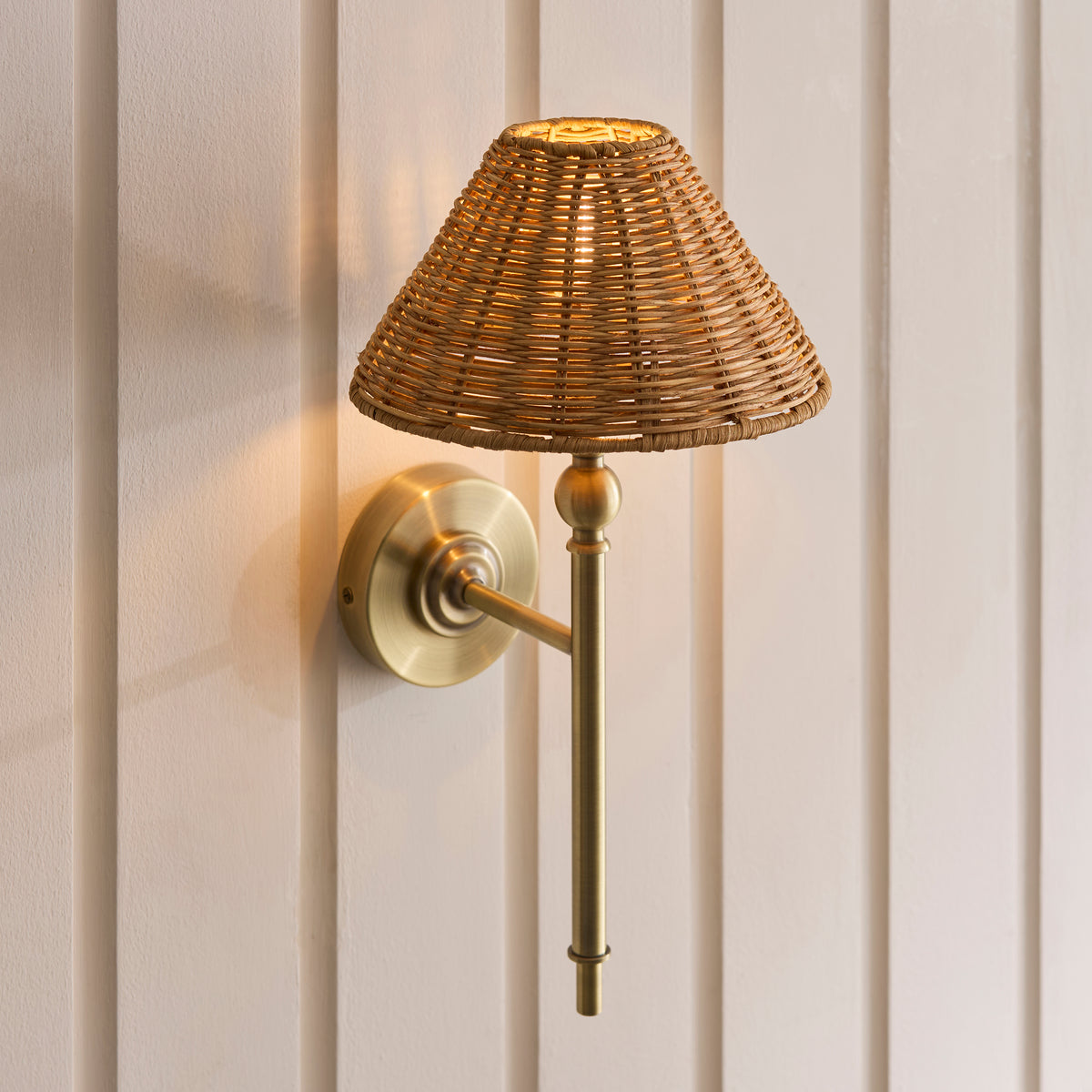 Jericho Wall Light in Antique Brass with Warm Brown Rattan Shade