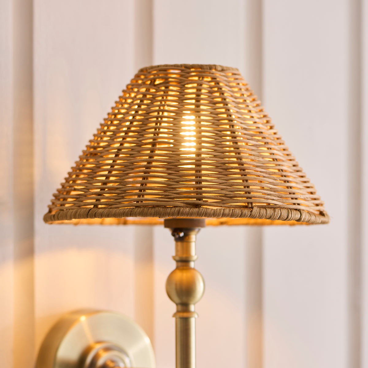 Jericho Wall Light in Antique Brass with Warm Brown Rattan Shade