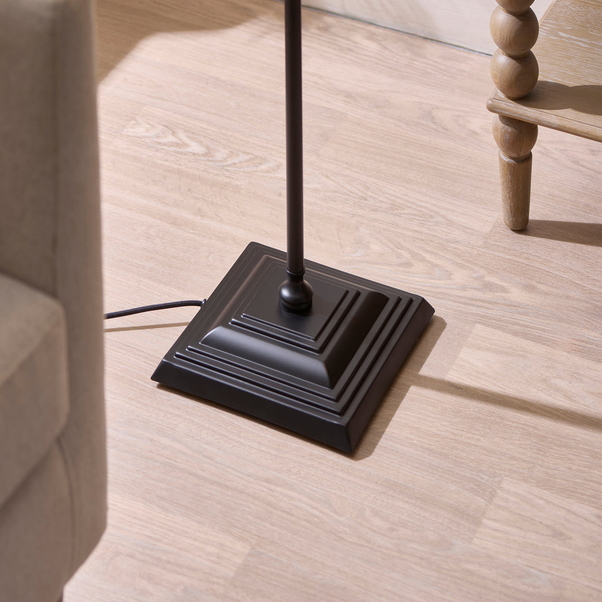 Jericho Floor Lamp in Matt Black with Warm Brown Rattan Shade