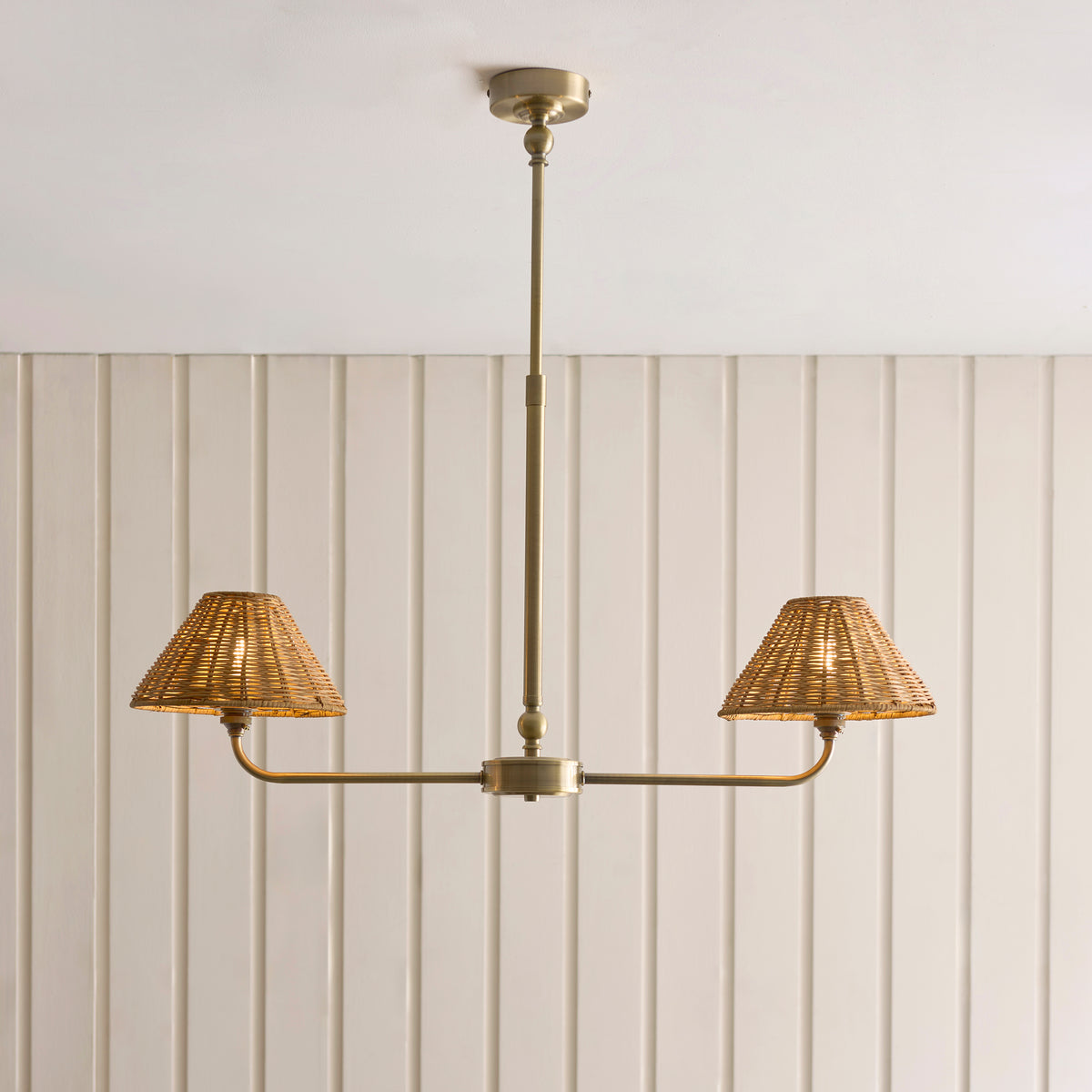 Jericho Two Light Linear Pendant in Antique Brass with Warm Brown Rattan Shades