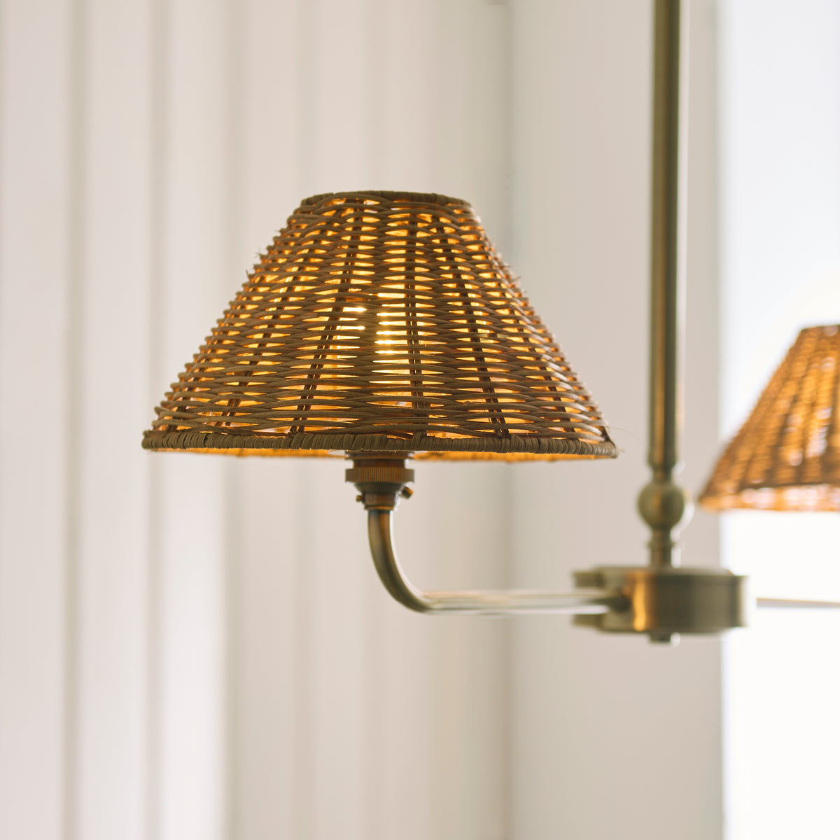 Jericho Two Light Linear Pendant in Antique Brass with Warm Brown Rattan Shades