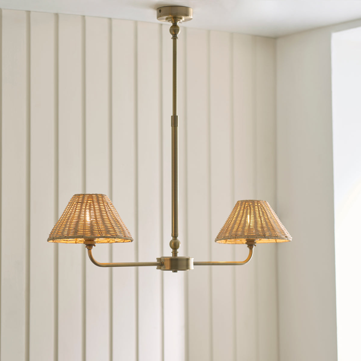 Jericho Two Light Linear Pendant in Antique Brass with Natural Rattan Shades