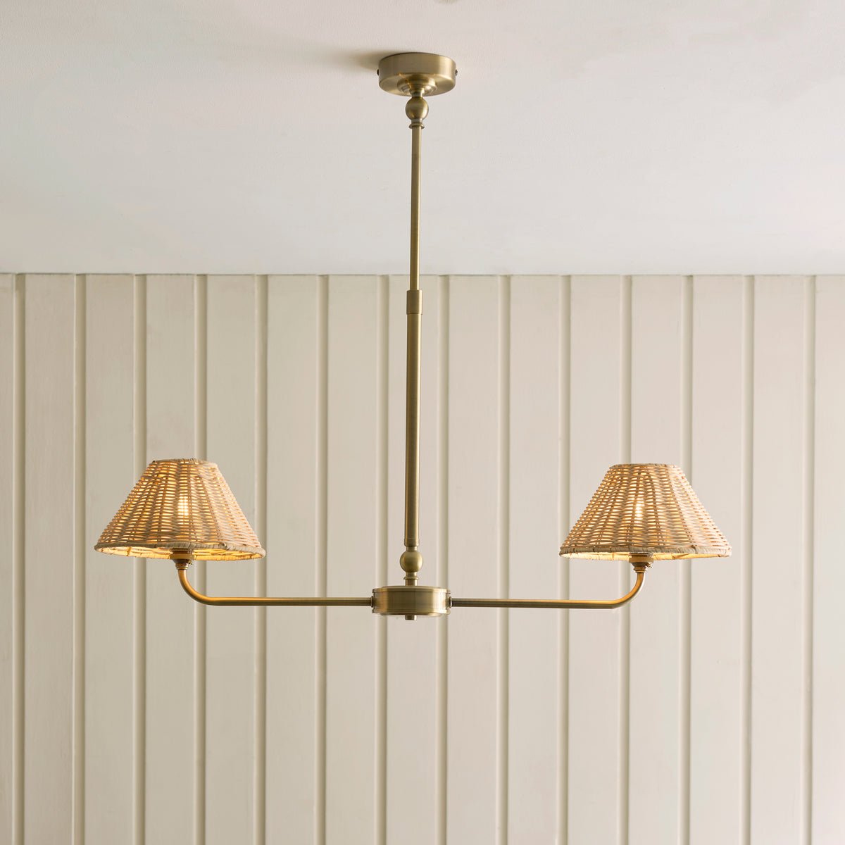 Jericho Two Light Linear Pendant in Antique Brass with Natural Rattan Shades