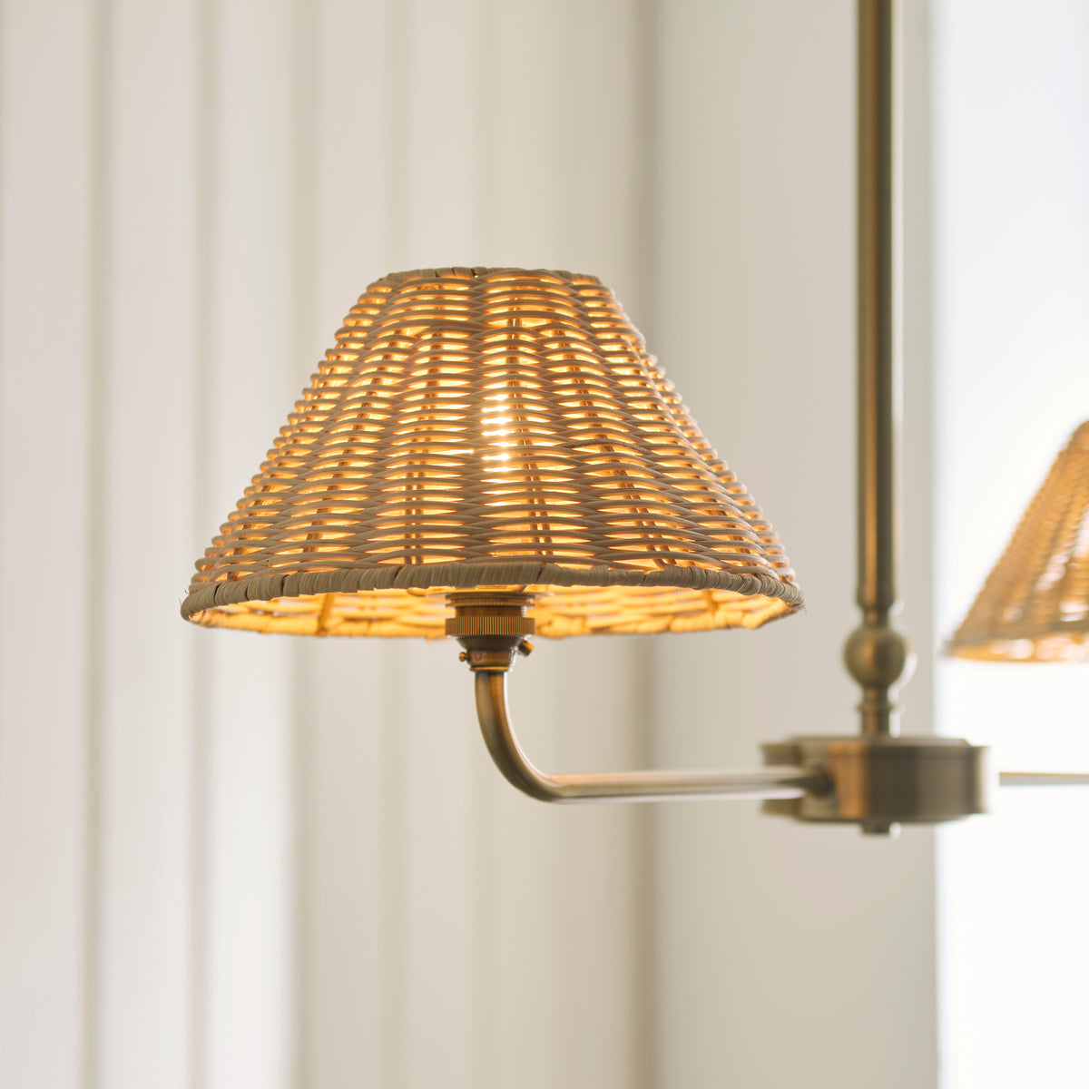 Jericho Two Light Linear Pendant in Antique Brass with Natural Rattan Shades
