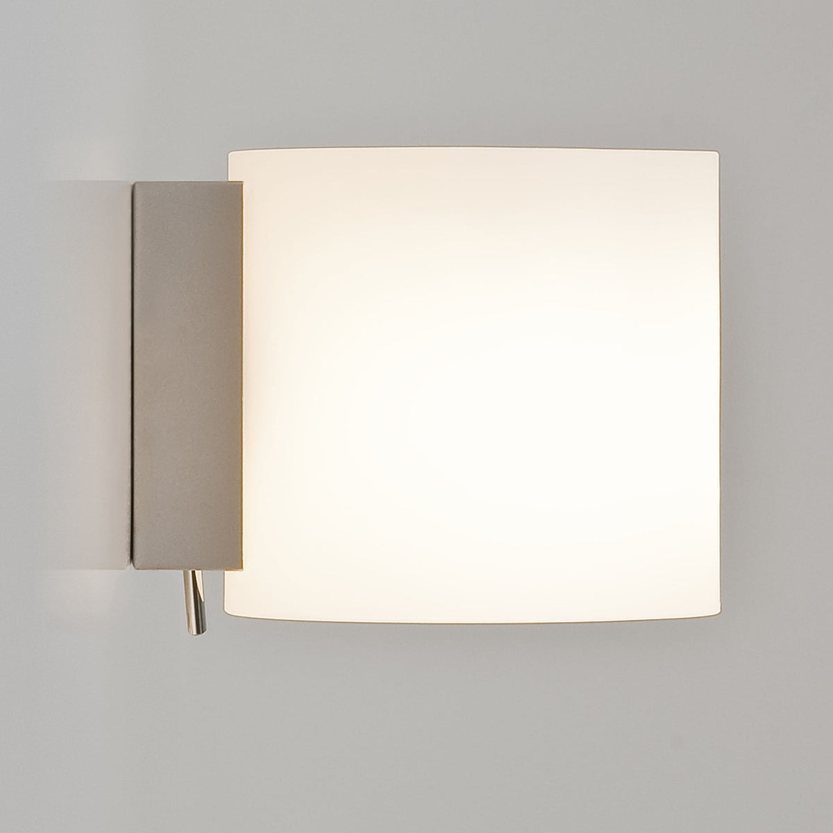 Square wall sconce with a white diffuser and a gray metal base