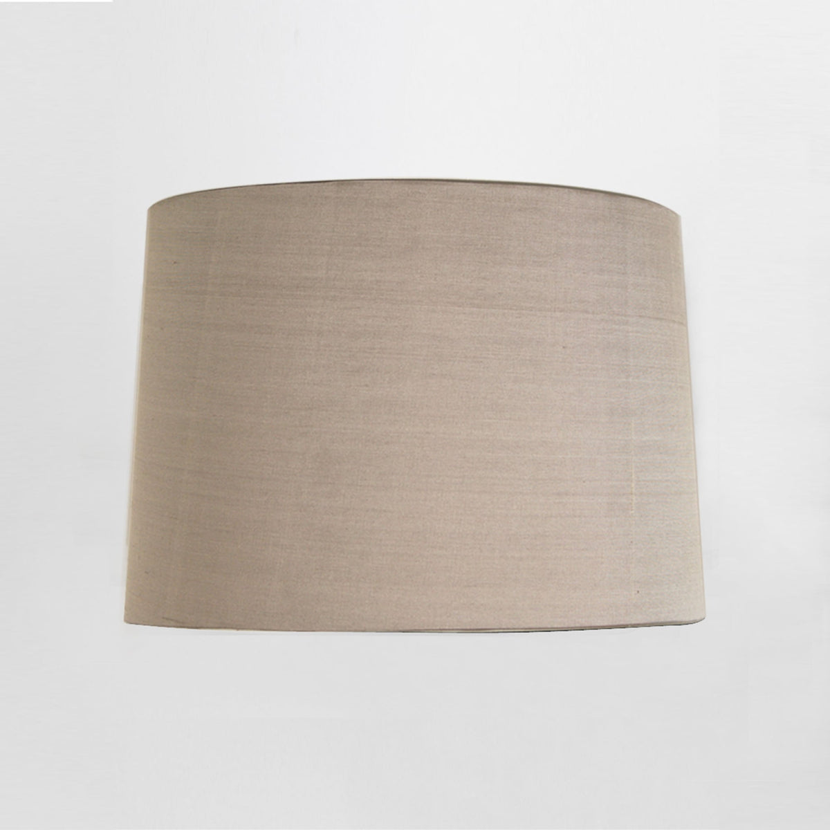 Close-up of a beige fabric lampshade with a subtle texture, against a white background.