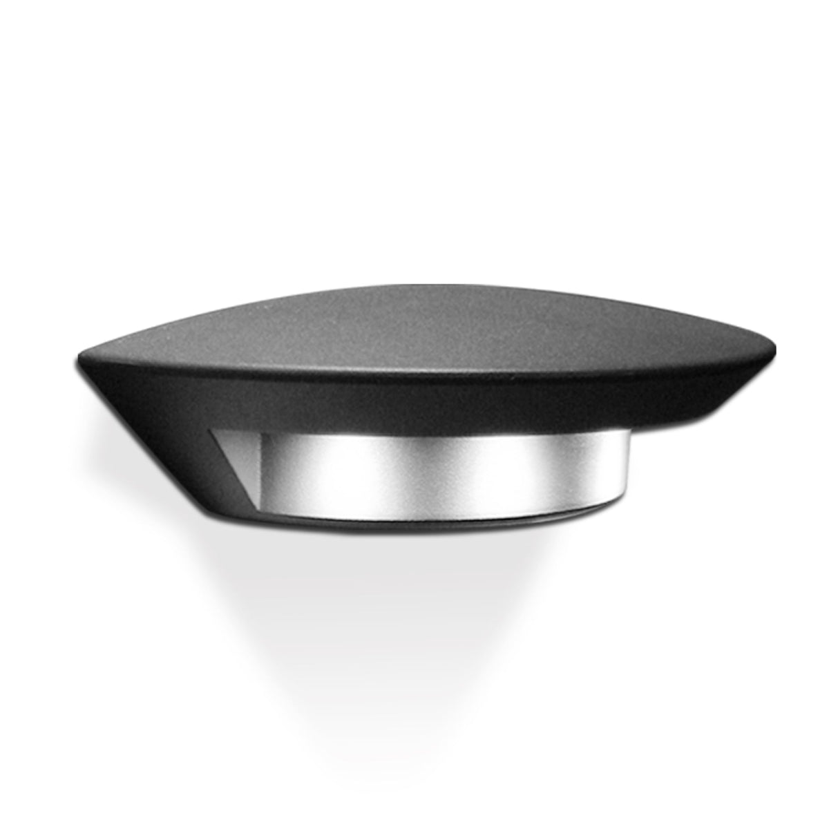 Black and silver circular object with a flat top and a slightly tapered base.