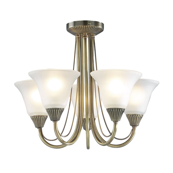 A five-light semi-flush ceiling light with an antique brass finish and frosted glass shades.