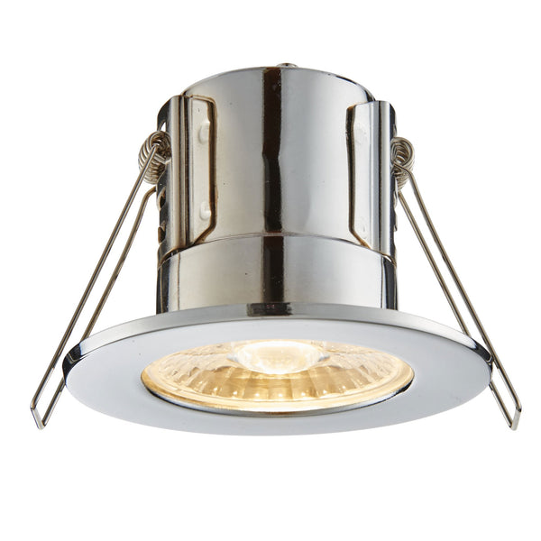 A chrome recessed spotlight with a warm glow, perfect for modern interiors.