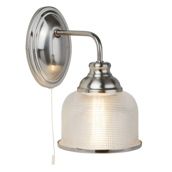 Classic brushed chrome wall light with a clear, ridged glass shade and pull cord switch.