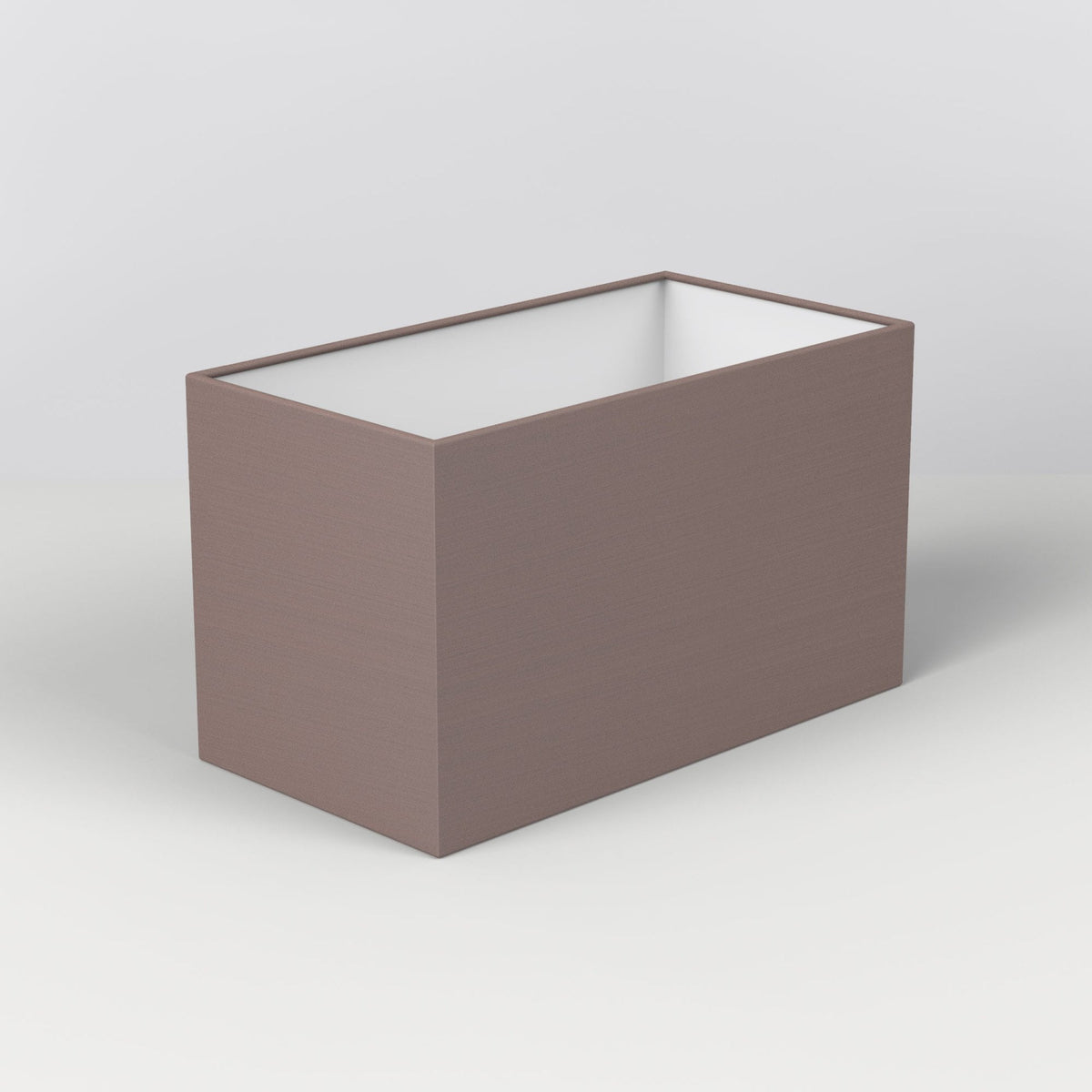Rectangular planter box in a muted brown color with a white interior