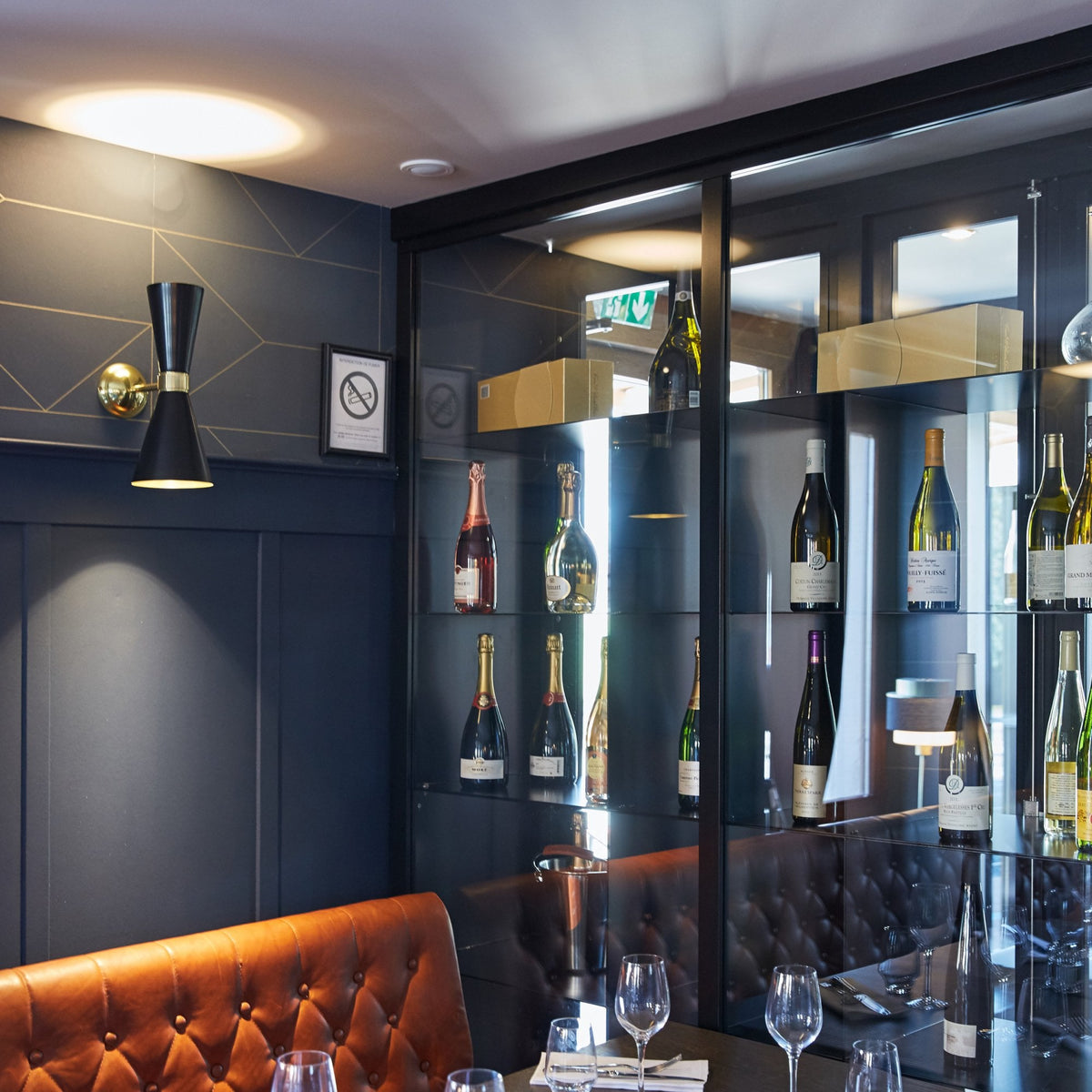 Cairo Wall Light in Matt Black and Polished Brass