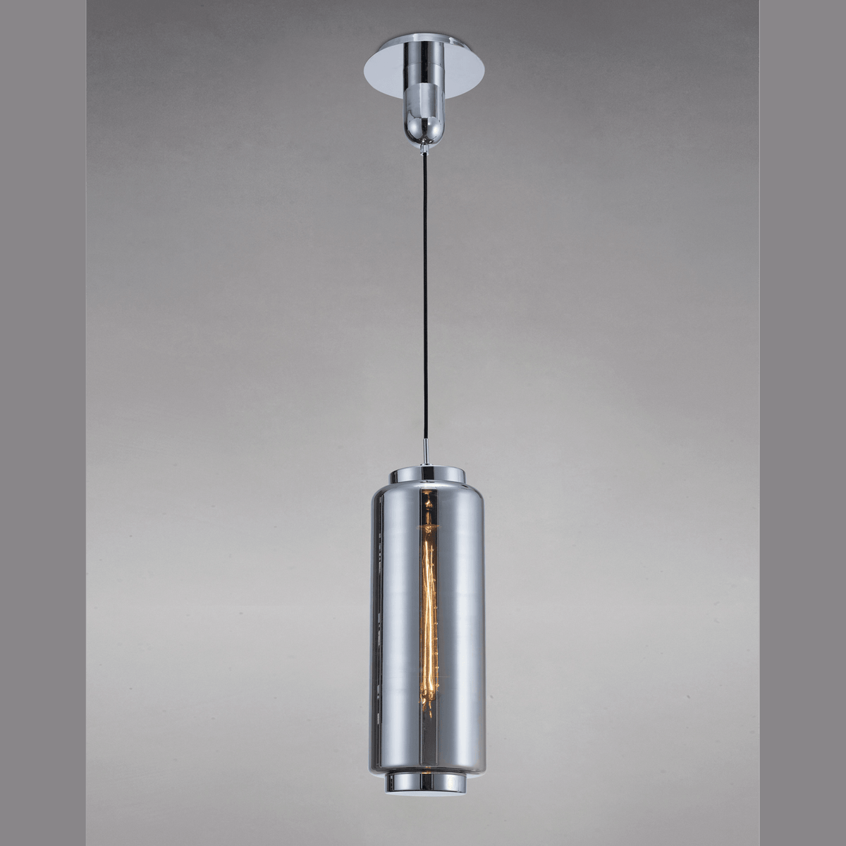 A chrome cylindrical pendant light with an exposed vintage-style bulb, on a grey background.