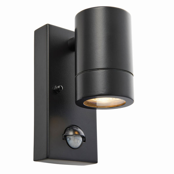 A black outdoor wall light with an integrated PIR motion sensor and a warm glow.