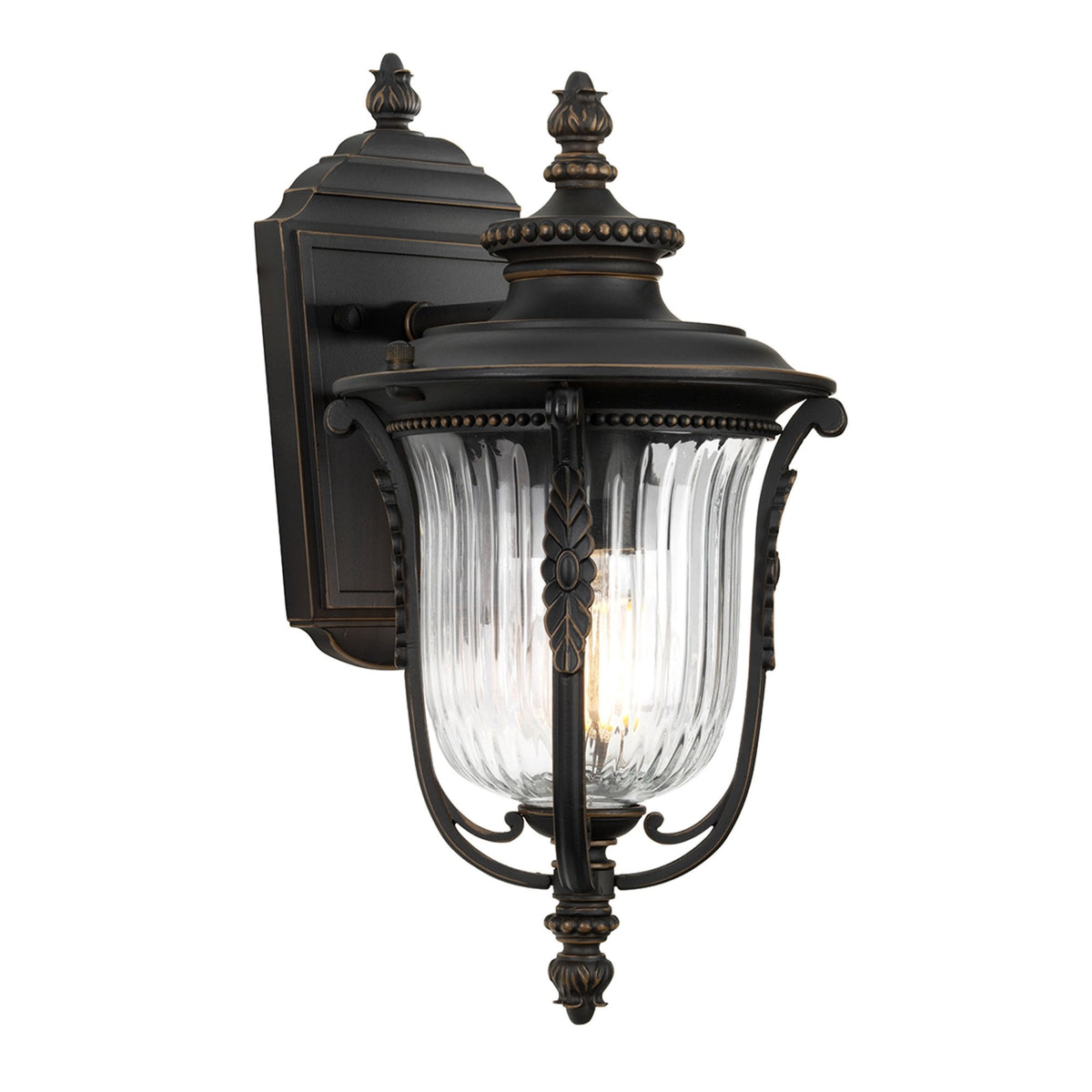 A classic outdoor wall light in black with clear fluted glass and decorative finials.