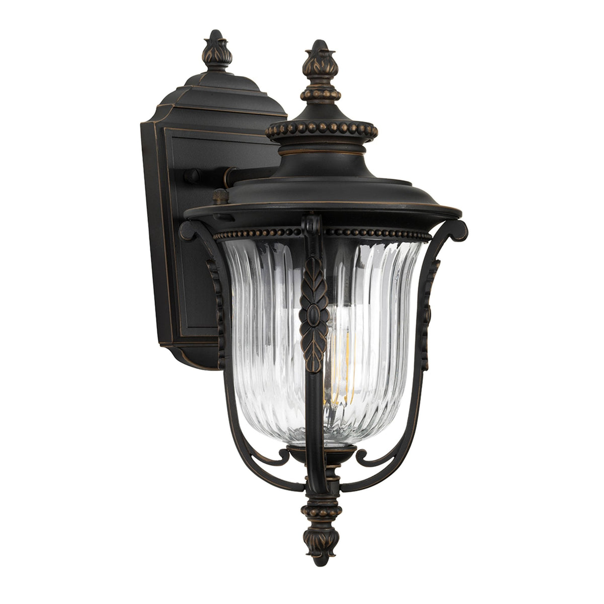 A classic outdoor wall light in black with clear fluted glass and decorative finials.