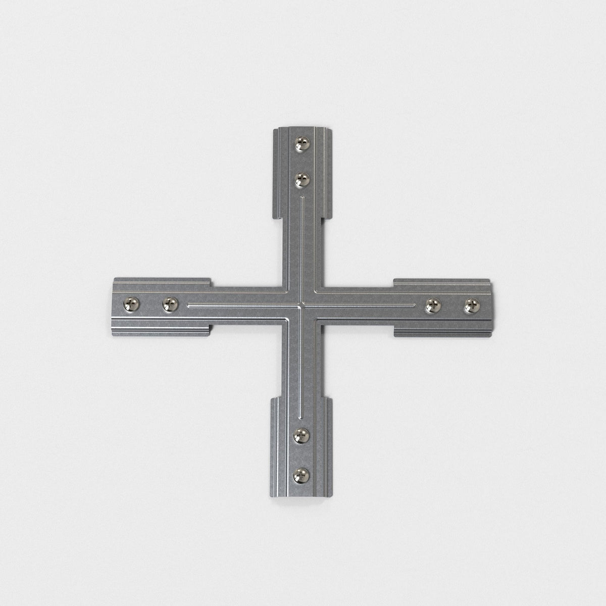 Silver metal cross-shaped connector with screws on a white background