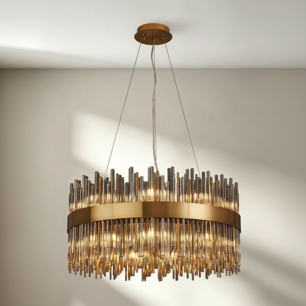 Round chandelier with a brass band and vertical glass rods
