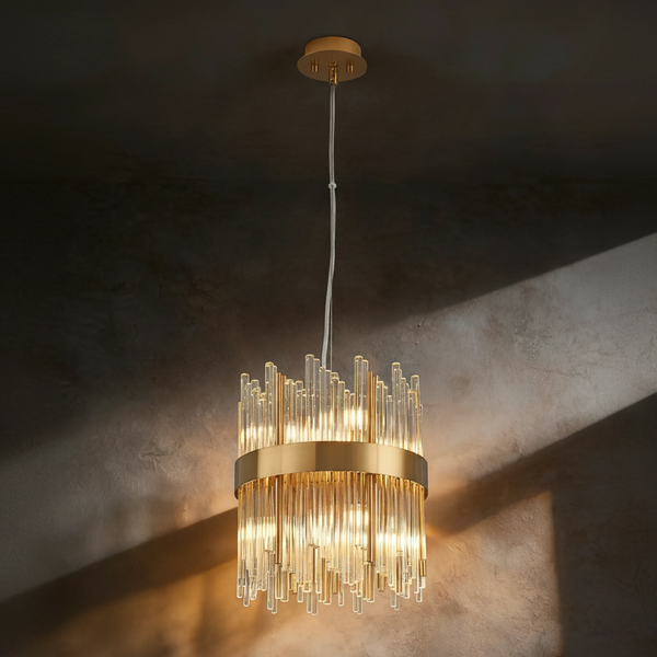 Gold and glass chandelier with multiple vertical glass rods and a gold band